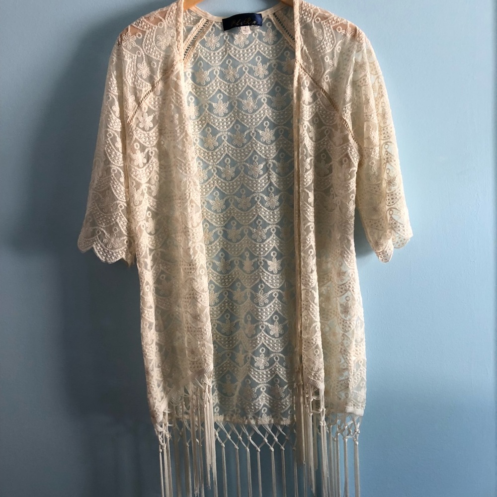 Francesca’s off white lace cardigan with fringe
